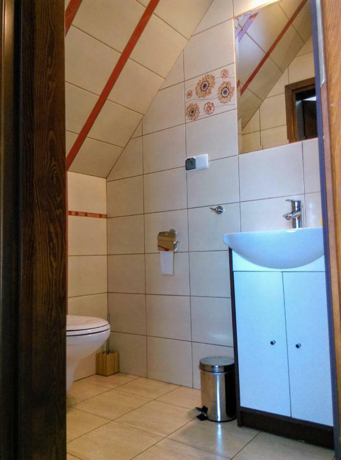 Gosciniec W Ogrodzie Apartment Brusy ภายนอก รูปภาพ